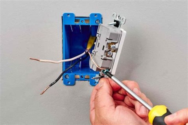 Do you need an electrician to install an outlet?