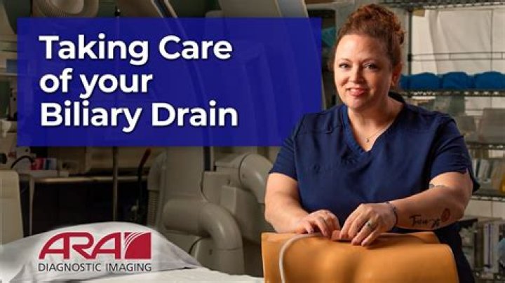 How do you care for a biliary drain tube?