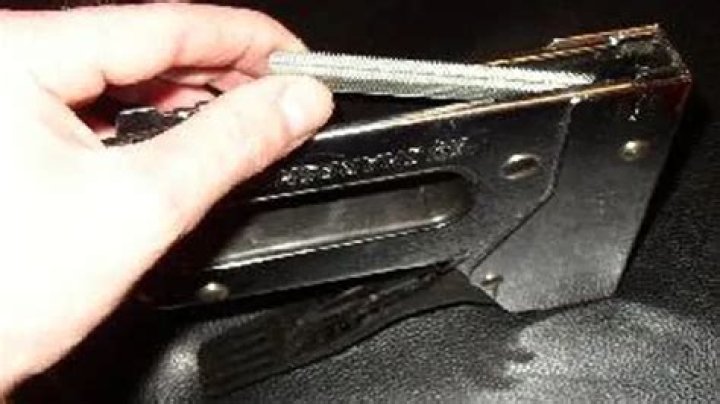 How do you open an old staple gun?