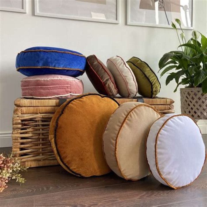What are the long circular pillows called?