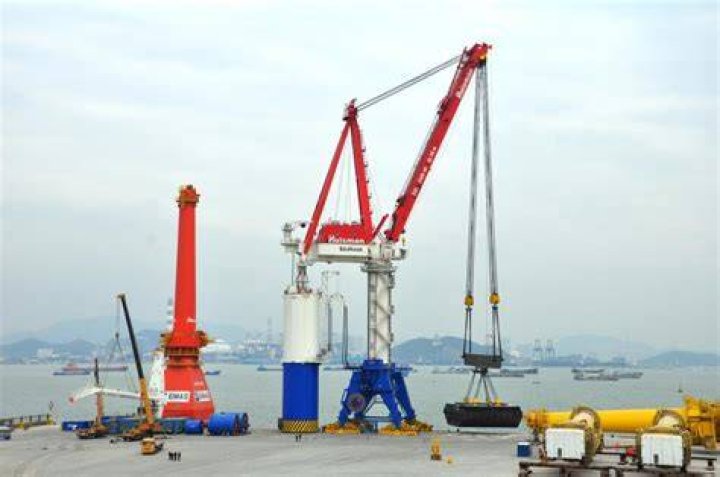 What is a Huisman crane used for?