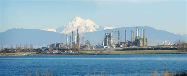 Who bought Shell refinery in Anacortes?